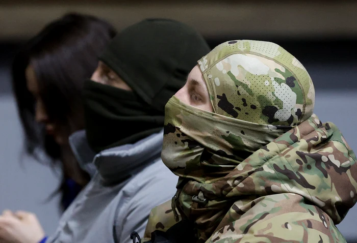 Luptători ai Corpului Voluntarilor Ruși la o conferință de presă la Kiev FOTO EPA-EFE